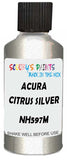 Detail brush applying Silver Metallic to a small door scratch on an Acura Integra, clean OEM finish