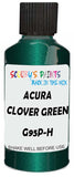 Detail brush applying Green Metallic to a small door scratch on an Acura El, clean OEM finish