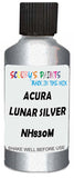 Detail brush applying Silver Metallic to a small door scratch on an Acura Ilx, clean OEM finish