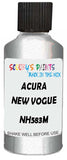 Detail brush applying Silver Metallic to a small door scratch on an Acura El, clean OEM finish