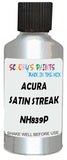 Detail brush applying Silver Metallic to a small door scratch on an Acura Nsx, clean OEM finish