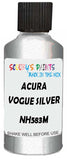 Detail brush applying Silver Metallic to a small door scratch on an Acura El, clean OEM finish
