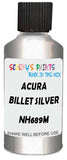Detail brush applying Silver Metallic to a small door scratch on an Acura Mdx, clean OEM finish