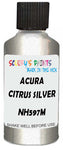Detail brush applying Silver Metallic to a small door scratch on an Acura Integra, clean OEM finish