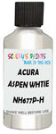 Detail brush applying White Metallic to a small door scratch on an Acura Mdx, clean OEM finish