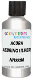 Detail brush applying Silver Metallic to a small door scratch on an Acura Rl, clean OEM finish