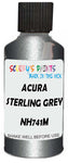 Detail brush applying Grey Metallic to a small door scratch on an Acura Mdx, clean OEM finish