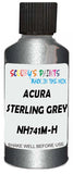 Detail brush applying Grey Metallic to a small door scratch on an Acura Mdx, clean OEM finish