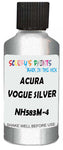 Detail brush applying Silver Metallic to a small door scratch on an Acura El, clean OEM finish