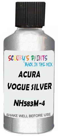 Detail brush applying Silver Metallic to a small door scratch on an Acura El, clean OEM finish