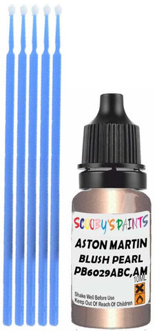 Close-up chip repair on 2018-2022 Aston Martin Db11 in factory Blush Pearl Metallic (paint code PB6029ABC,AM6029)