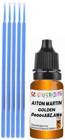 Close-up chip repair on 2017-2022 Aston Martin Dbx in factory Golden Saffron Metallic (paint code P6004ABZ,AM6004)