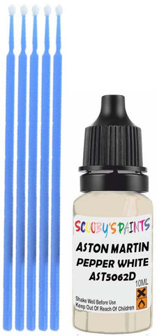 Close-up chip repair on 2007-2007 Aston Martin Db9 Coupe in factory Pepper White (paint code AST5062D)