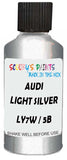 Detail brush applying Silver Metallic to a small door scratch on an Audi A2 Color Storm, clean OEM finish