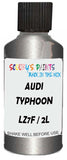 Detail brush applying Grey Metallic to a small door scratch on an Audi Q4, clean OEM finish