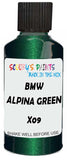 Detail brush applying Green Metallic to a small door scratch on an Bmw 6-Series Gran Coupe, clean OEM finish
