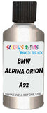 Detail brush applying Silver Metallic to a small door scratch on an Bmw Alpina, clean OEM finish