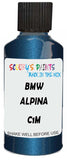 Detail brush applying Blue Metallic to a small door scratch on an Bmw Alpina, clean OEM finish