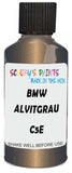 Detail brush applying Beige Metallic to a small door scratch on an Bmw 6-Series Gt, clean OEM finish