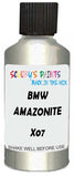 Detail brush applying Silver Metallic to a small door scratch on an Bmw 5-Series Touring, clean OEM finish