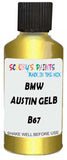 Detail brush applying Yellow Metallic to a small door scratch on an Bmw 7-Series, clean OEM finish