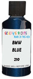 Detail brush applying Blue Metallic to a small door scratch on an Bmw M1, clean OEM finish