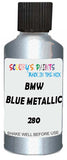 Detail brush applying Blue Metallic to a small door scratch on an Bmw 7-Series, clean OEM finish