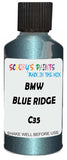 Detail brush applying Blue Metallic to a small door scratch on an Bmw Ix, clean OEM finish