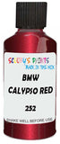 Detail brush applying Red Metallic to a small door scratch on an Bmw 7-Series, clean OEM finish