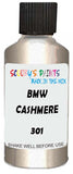 Detail brush applying Beige Metallic to a small door scratch on an Bmw 7-Series, clean OEM finish