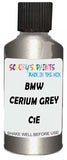 Detail brush applying Grey Metallic to a small door scratch on an Bmw 8-Series, clean OEM finish