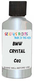 Detail brush applying White Metallic to a small door scratch on an Bmw I8, clean OEM finish