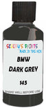 Detail brush applying Grey Solid to a small door scratch on an Bmw 7-Series, clean OEM finish