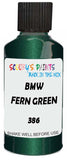 Detail brush applying Green Metallic to a small door scratch on an Bmw M3, clean OEM finish