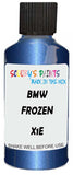 Detail brush applying Blue Metallic to a small door scratch on an Bmw M4, clean OEM finish