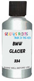 Detail brush applying Green Metallic to a small door scratch on an Bmw 7-Series, clean OEM finish
