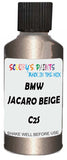 Detail brush applying Beige Metallic to a small door scratch on an Bmw 5-Series Limousine, clean OEM finish