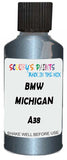 Detail brush applying Blue Metallic to a small door scratch on an Bmw 7-Series, clean OEM finish