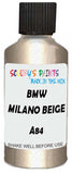 Detail brush applying Beige Metallic to a small door scratch on an Bmw 7-Series, clean OEM finish