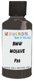Detail brush applying Brown Solid to a small door scratch on an Bmw M3, clean OEM finish