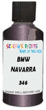 Detail brush applying Purple Metallic to a small door scratch on an Bmw 7-Series, clean OEM finish