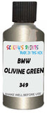 Detail brush applying Green Metallic to a small door scratch on an Bmw 7-Series, clean OEM finish