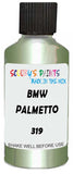 Detail brush applying Green Metallic to a small door scratch on an Bmw 7-Series, clean OEM finish