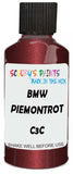 Detail brush applying Red Metallic to a small door scratch on an Bmw 5-Series Limousine, clean OEM finish