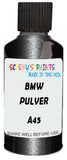 Detail brush applying Black Metallic to a small door scratch on an Bmw M4, clean OEM finish