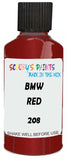 Detail brush applying Red Metallic to a small door scratch on an Bmw M1, clean OEM finish