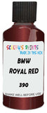 Detail brush applying Red Metallic to a small door scratch on an Bmw 7-Series, clean OEM finish