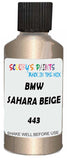 Detail brush applying Beige Metallic to a small door scratch on an Bmw 7-Series, clean OEM finish
