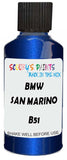 Detail brush applying Blue Metallic to a small door scratch on an Bmw 7-Series, clean OEM finish
