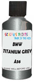 Detail brush applying Grey Metallic to a small door scratch on an Bmw 7-Series, clean OEM finish